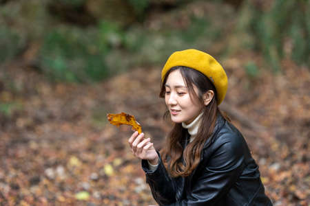 Beautiful autumn leaves and beautiful Japanese women in Japan
