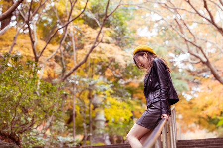 Beautiful autumn leaves and beautiful Japanese women in Japanの写真素材