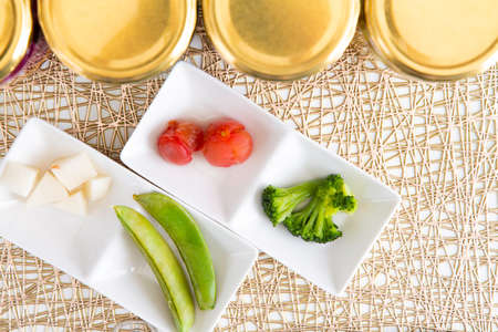 Colorful pickles of delicious summer vegetables