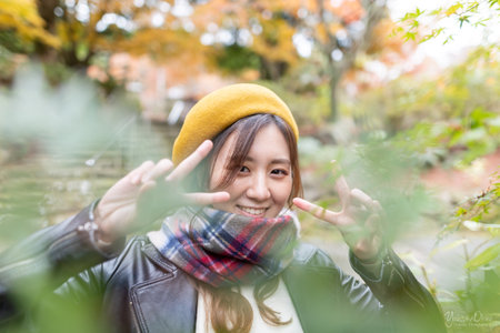 Beautiful autumn leaves and beautiful Japanese women in Japanの写真素材