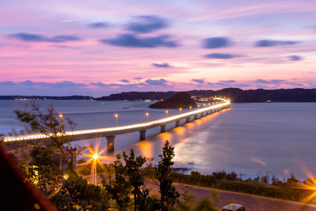 Beautiful sunset over the sea with bridge in the foreground,japanの写真素材