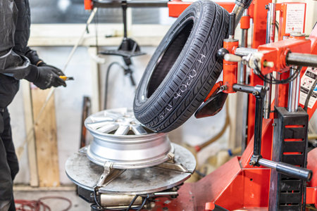 Where brake pads and tires are changed at an automobile repair shopの写真素材