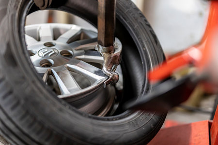 Where brake pads and tires are changed at an automobile repair shopの写真素材