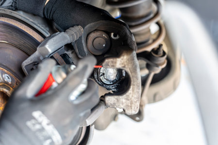 Where brake pads and tires are changed at an automobile repair shop