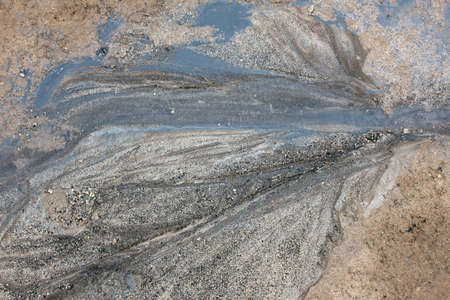 Surface of cracked ground for texture background. Soil drought cracked in the geothermal area Hverir near lake Myvatn, Iceland.の写真素材