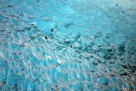 Blue iceberg. Glacier floating on the water. Close up.の写真素材