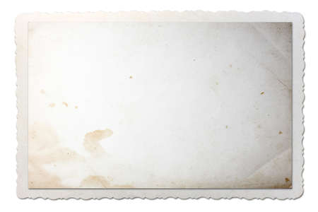 Old photo paper texture with stains and scratches isolated on white background. Old photo frame, vintage paper, retro card.の写真素材