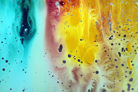 Abstract hand drawn watercolor background, stain watercolors colors between wet glasses. Used macro lens.の写真素材