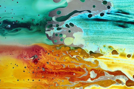 Abstract hand drawn watercolor background, stain watercolors colors between wet glasses. Used macro lens.の写真素材
