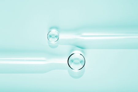 Chemical laboratory research. Abstract cosmetic laboratory. Glass models of molecules with pipettes. Flat lay. Copy space.の写真素材