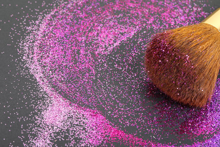 Colorful glitter crystals of eyelids makeup on black  background. Beauty and fashion concept. Copy space.の写真素材