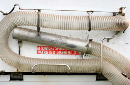 Hose for vacuum suction of street waste on a communal vehicleの写真素材