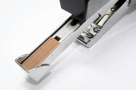 Office stapler filled with staples isolated on white backgroundの写真素材