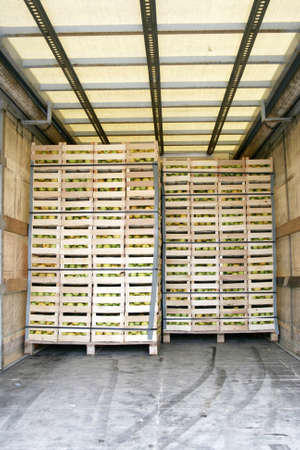 Storage space in a truck full of applesの写真素材