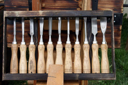 Carpentry tools, chisels of various thicknesses and shapes