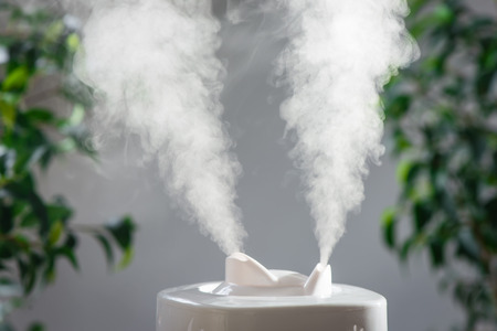 ultrasonic humidifier in the house. Humidification. Vaporの写真素材