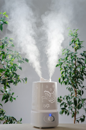 ultrasonic humidifier in the house. Humidification. Vaporの写真素材