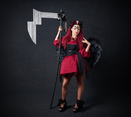 MINSK, BELARUS - NOVEMBER 03, 2018: UniÐ¡on Convention & Game Expo Minsk 2018. Cosplayer young woman shoot on black background in photo zoneのeditorial素材