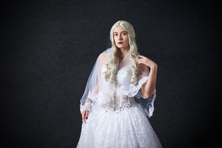 MINSK, BELARUS - NOVEMBER 03, 2018: UniÐ¡on Convention & Game Expo Minsk 2018. Cosplayer young woman as princess Lily from Alice in wonderland shoot in photo zoneのeditorial素材