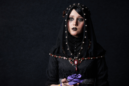 MINSK, BELARUS - NOVEMBER 03, 2018: UniÐ¡on Convention & Game Expo Minsk 2018. Cosplayer young woman shoot on black background in photo zoneのeditorial素材