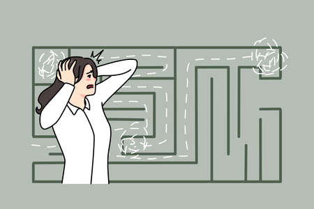 Anxious woman confused by finding way in labyrinthのイラスト素材