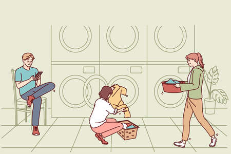 People washing clothes in laundromatのイラスト素材