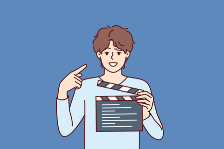 Man producer with clapboard in hands looks at screen while working on set of film or clipのイラスト素材