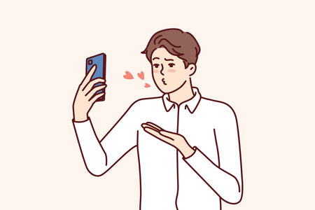 Man with mobile phone sends air kiss to interlocutor during video call to girlfriendのイラスト素材