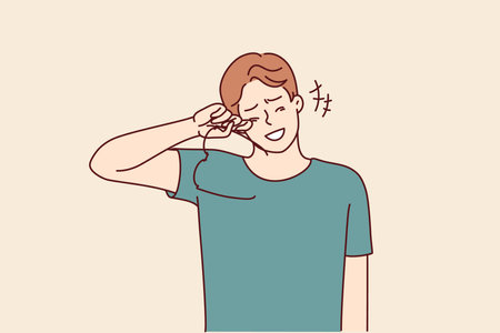 Laughing man takes off glasses wiping tears of joy from eyes after hearing joke or good newsのイラスト素材