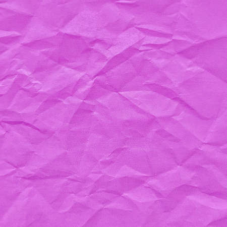 Realistic crumpled purple paper texture backgroundの写真素材