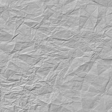 Realistic crumpled gray paper texture backgroundの写真素材