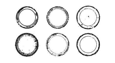 Vintage grunge stamps with distressed round shapes creating a worn and retro textured designのイラスト素材