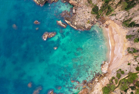 Aerial view of Costa Brava beach with turquoise and natural water.の写真素材