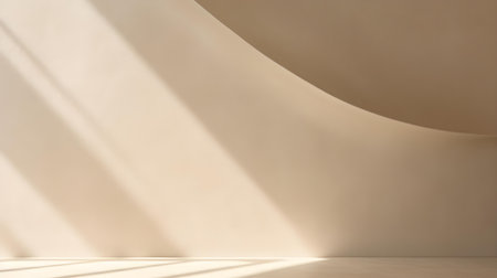 Empty Room in Beige Colors with Shadows on the Wall. Elegant Studio Background for Product Presentation.の素材