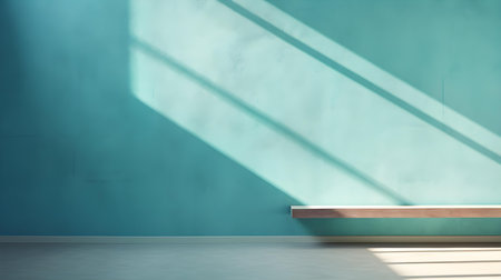 Empty Room in cyan Colors with Shadows on the Wall. Minimal podium for product presentation.の素材