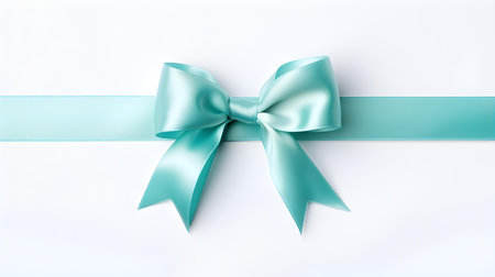 Turquoise Gift Ribbon with a Bow on a white Background. Festive Template for Holidays and Celebrationsの素材