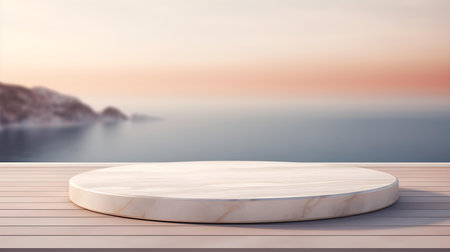 Round Marble Podium in ivory Colors in front of a blurred Seascape. Luxury backdrop for product presentationの素材