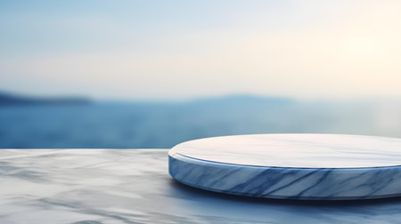 Round Marble Podium in navy Colors in front of a blurred Seascape. Luxury backdrop for product presentationの素材