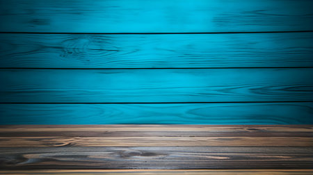 Close up of a wooden table in front of a cyan wall. Rustic Backdrop with Copy Spaceの素材
