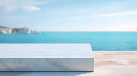 Square Marble Podium in cyan Colors in front of a blurred Seascape. Luxury backdrop for product presentationの素材