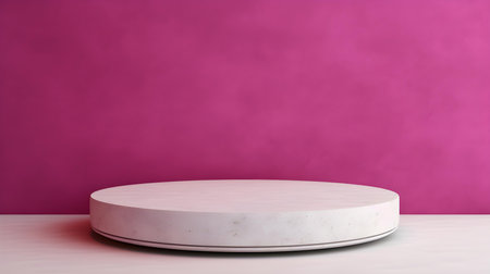 Round Stone Podium in front of a fuchsia Studio Background. White Pedestal for Product Presentationの素材
