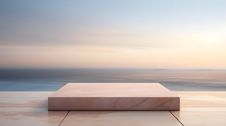 Square Marble Podium in light brown Colors in front of a blurred Seascape. Luxury backdrop for product presentationの素材