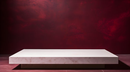 Square Stone Podium in front of a dark red Studio Background. White Pedestal for Product Presentationの素材