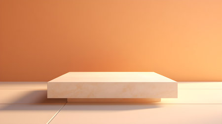 Square stone podium in front of a light orange studio background. White Pedestal for Product Presentationの素材