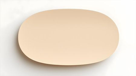 Beige oval paper note on a white background. Brainstorming template with copy spaceの素材