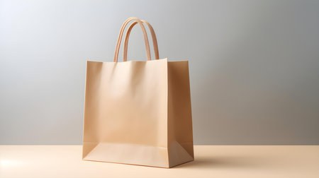 Beige shopping bag on a light background with copy space. Template for sales and auctionsの素材