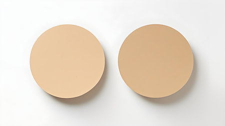 Two beige round paper notes on a white background. Brainstorming template with copy spaceの素材