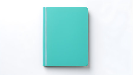Blank cyan notebook on a white background. Business Mockup with Copy Spaceの素材