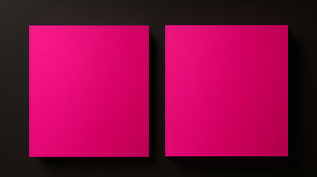 Two fuchsia square paper notes on a black background. Brainstorming template with copy spaceの素材