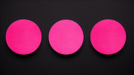 Set of hot pink round paper notes on a black background. Brainstorming template with copy spaceの素材